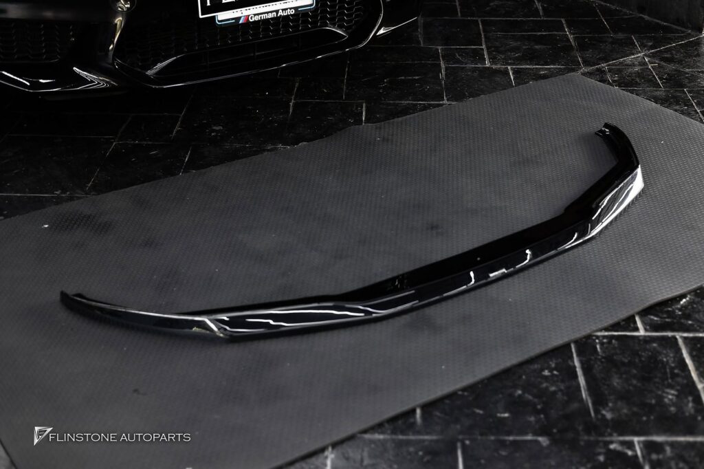 ลิ้นหน้าสีดำเงาสำหรับ BMW F90 M5