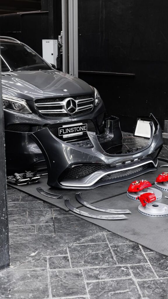 Mercedes-Benz GLE-Class getting ready to fit the body kit GLE63 AMG with a red brake kit A