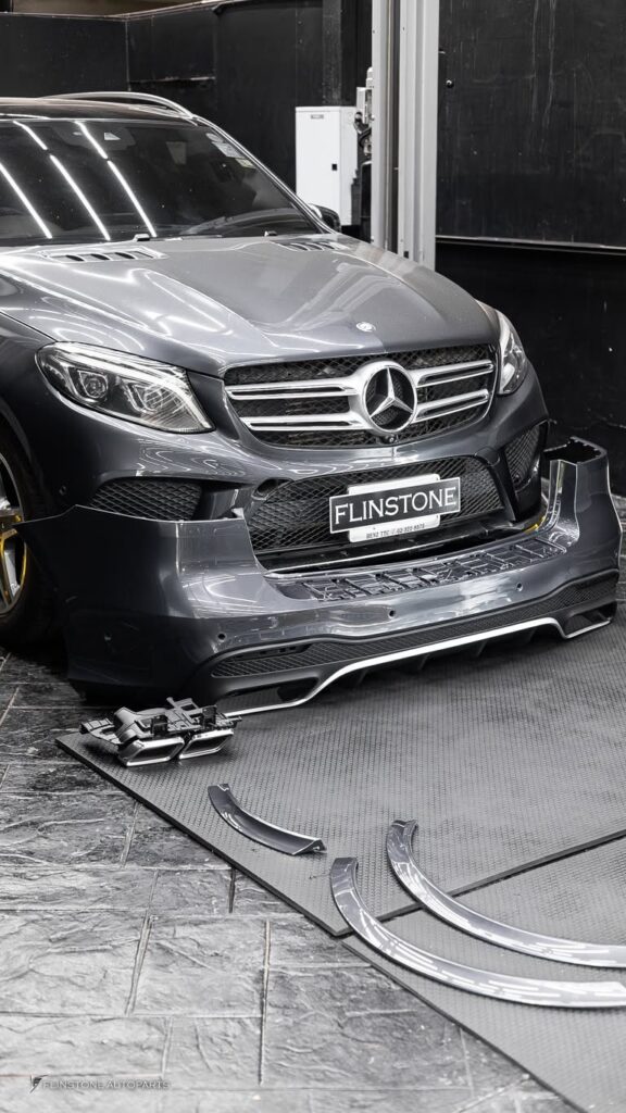 Mercedes-Benz GLE-Class getting ready to fit the body kit GLE63 AMG with a red brake kit A