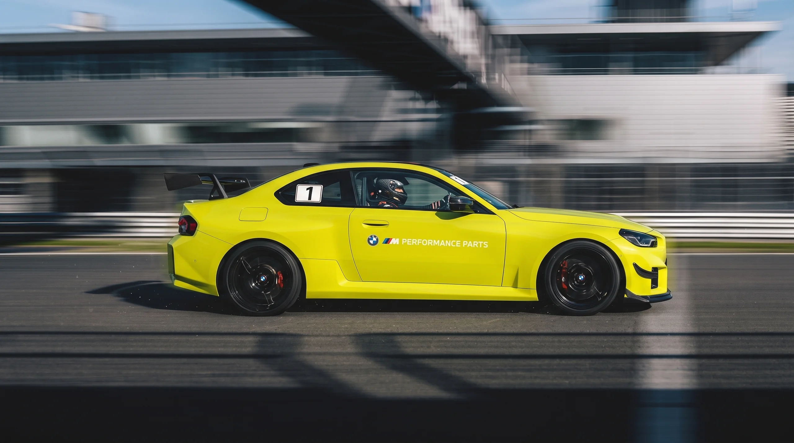BMW M2 body kit fitting M Performance Parts while running on track