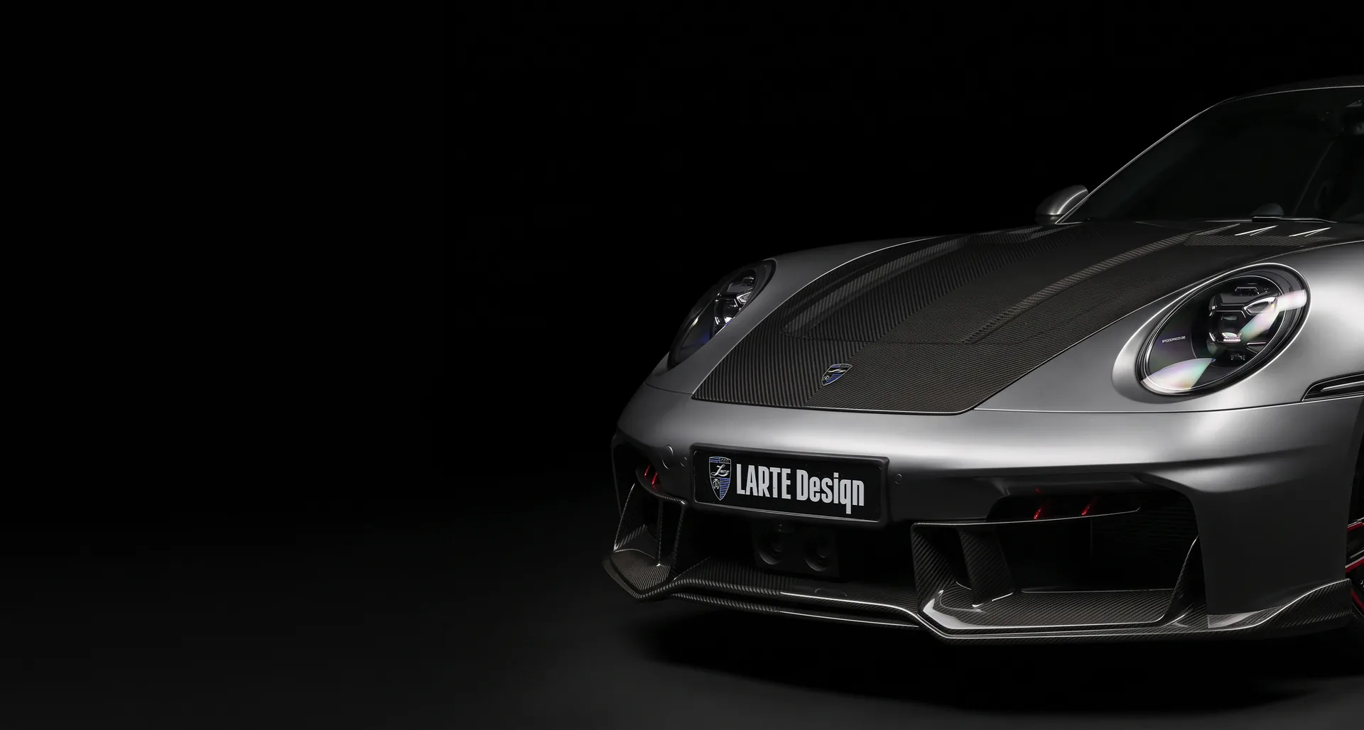 Porsche 911 with LARTE Design carbon fiber hood and front body kit