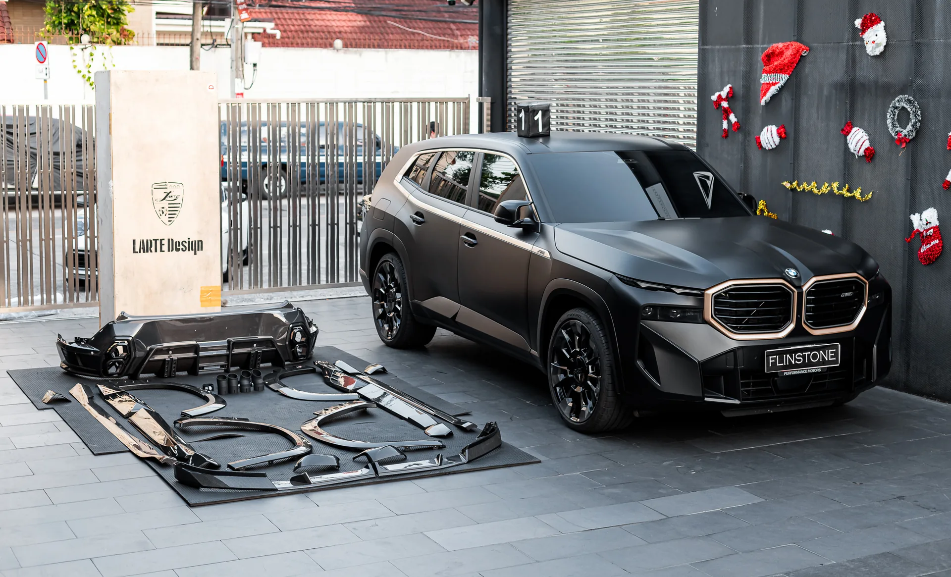 BMW XM with a LARTE Design carbon body kit at Flinstone Autoparts