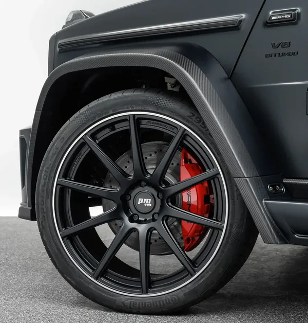 ล้อฟอร์จ PERFORMMASTER G-forged บน Mercedes-AMG G63 สีดำด้าน คาลิปเปอร์แดง