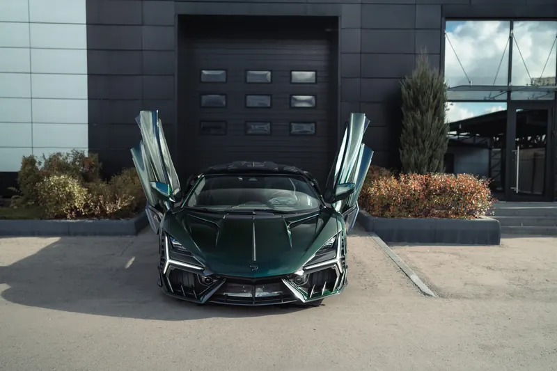 Lamborghini Revuelto with TOPCAR DESIGN R’Evo body kit — Front view with scissor doors open