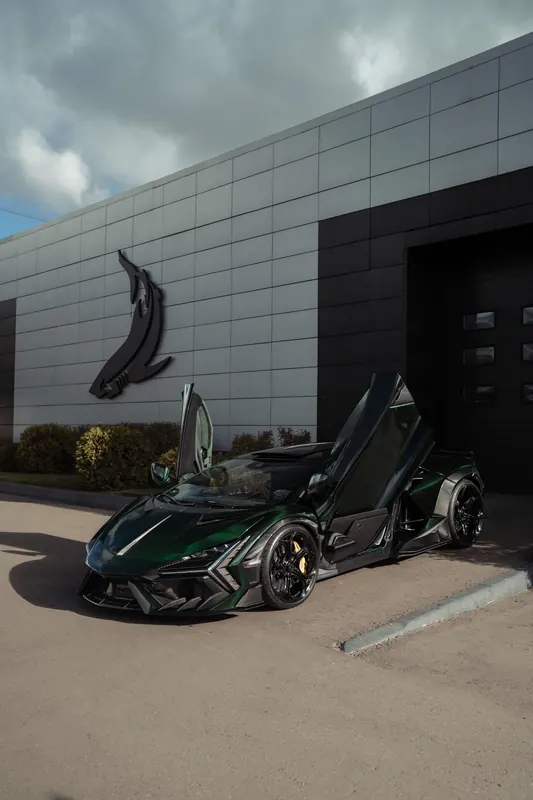 Lamborghini Revuelto with TOPCAR DESIGN R’Evo body kit — Front three-quarter view, doors open