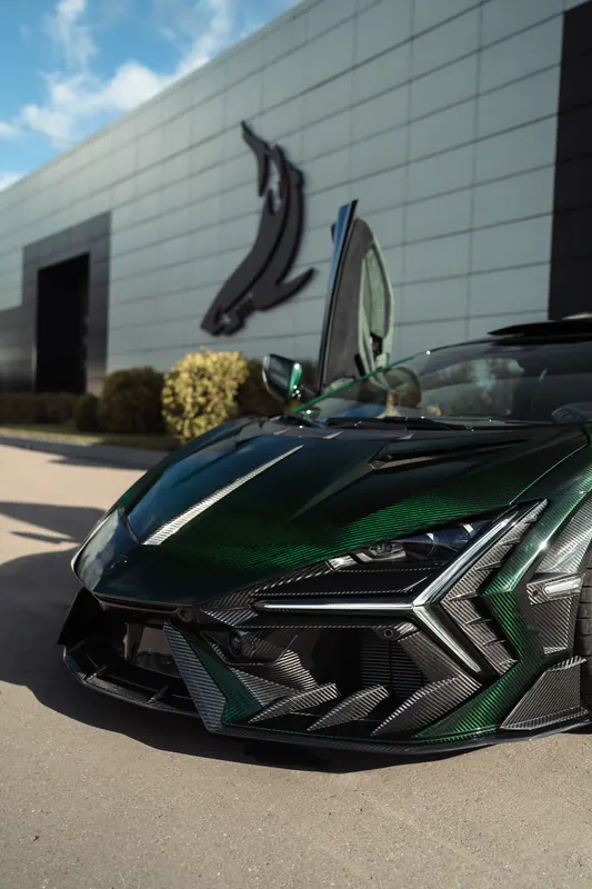 Lamborghini Revuelto with TOPCAR DESIGN R’Evo body kit — Carbon front bumper, low angle