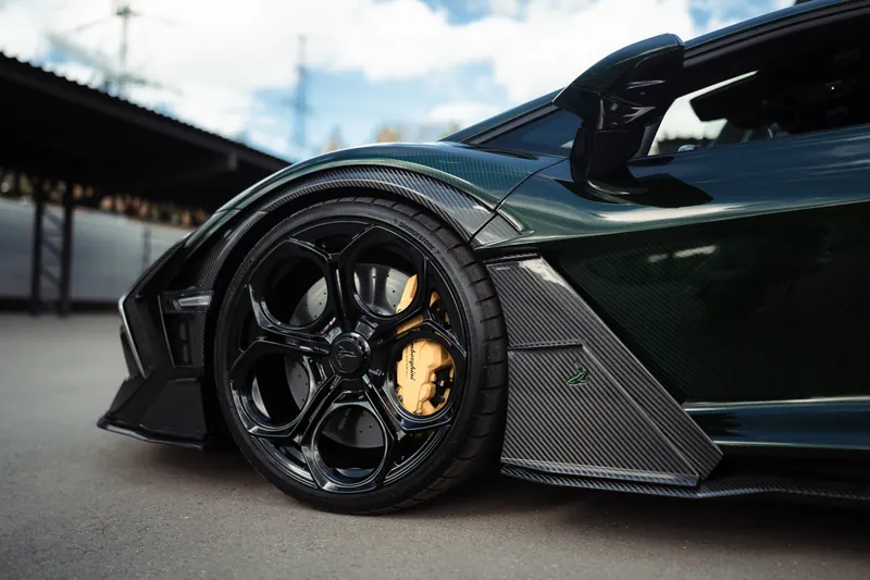 Lamborghini Revuelto with TOPCAR DESIGN R’Evo body kit — Side view, low angle