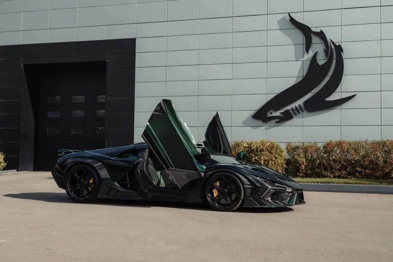 Lamborghini Revuelto with TOPCAR DESIGN R’Evo body kit — Side view with scissor doors open