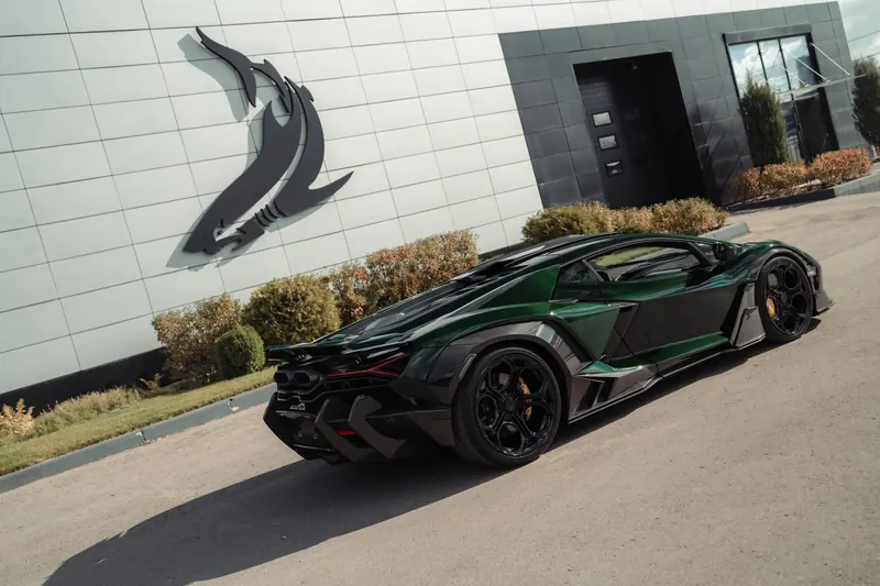 Lamborghini Revuelto with TOPCAR DESIGN R’Evo body kit — Rear three-quarter view outside the showroom