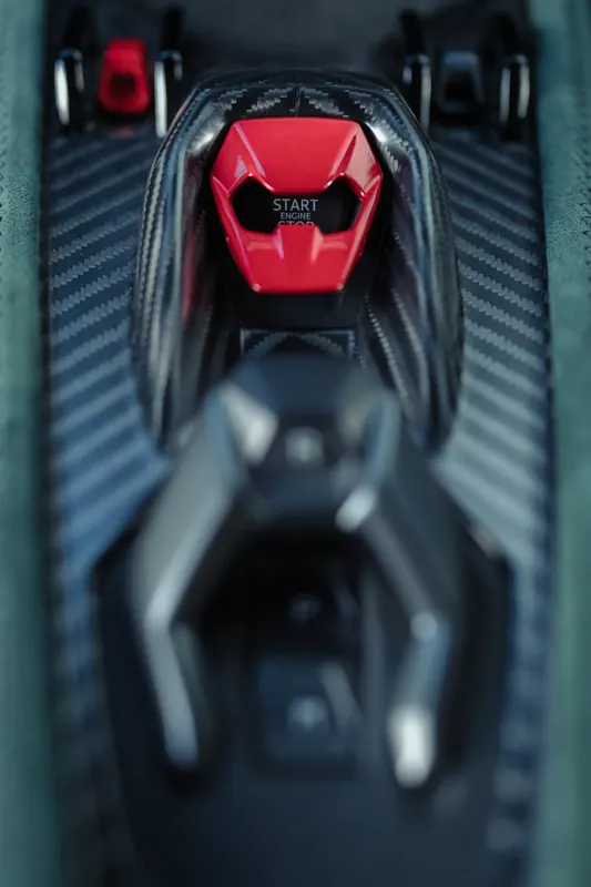 Lamborghini Revuelto with TOPCAR DESIGN R’Evo body kit — Red start button