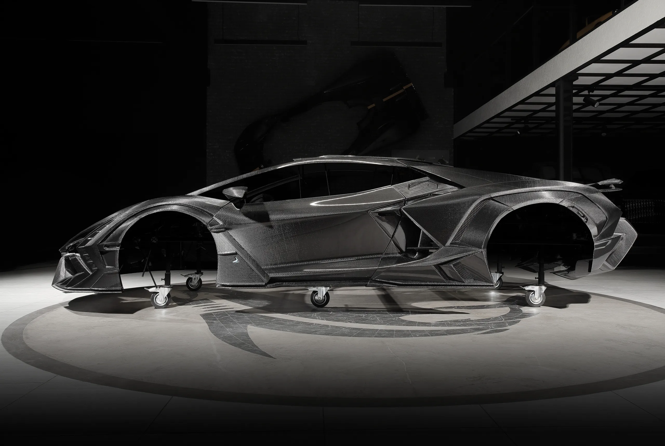 Side view of a Lamborghini Revuelto with TOPCAR R’Evo Carbon Edition carbon fiber body