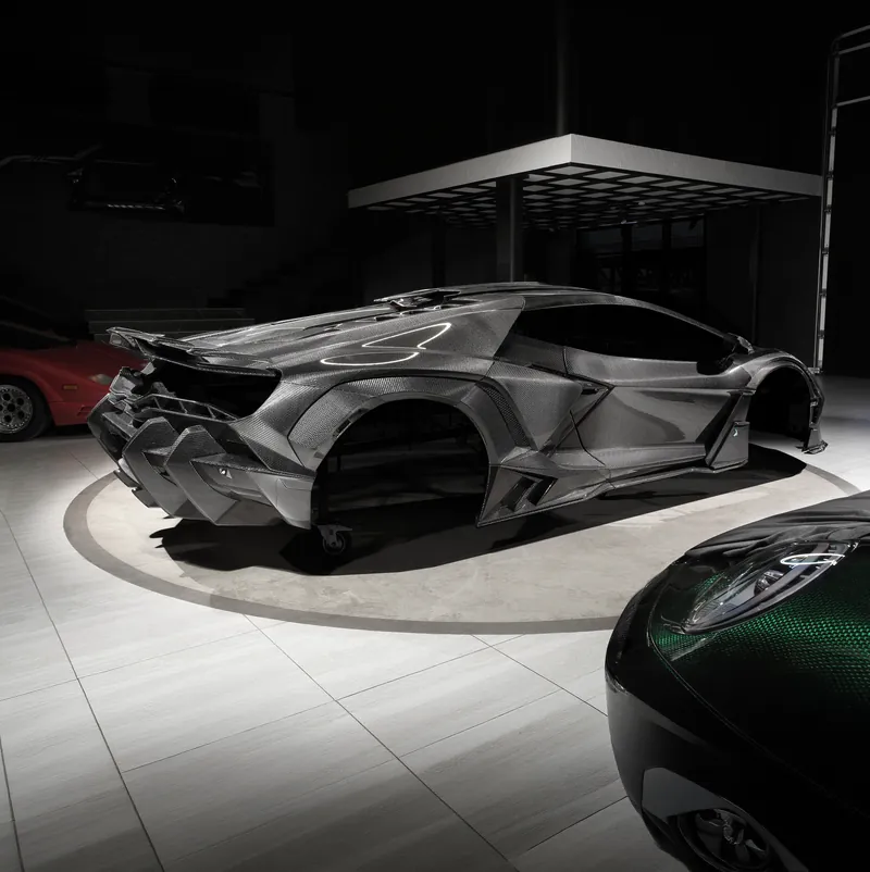 Rear three-quarter view of a Lamborghini Revuelto with TOPCAR R’Evo Carbon Edition body kit