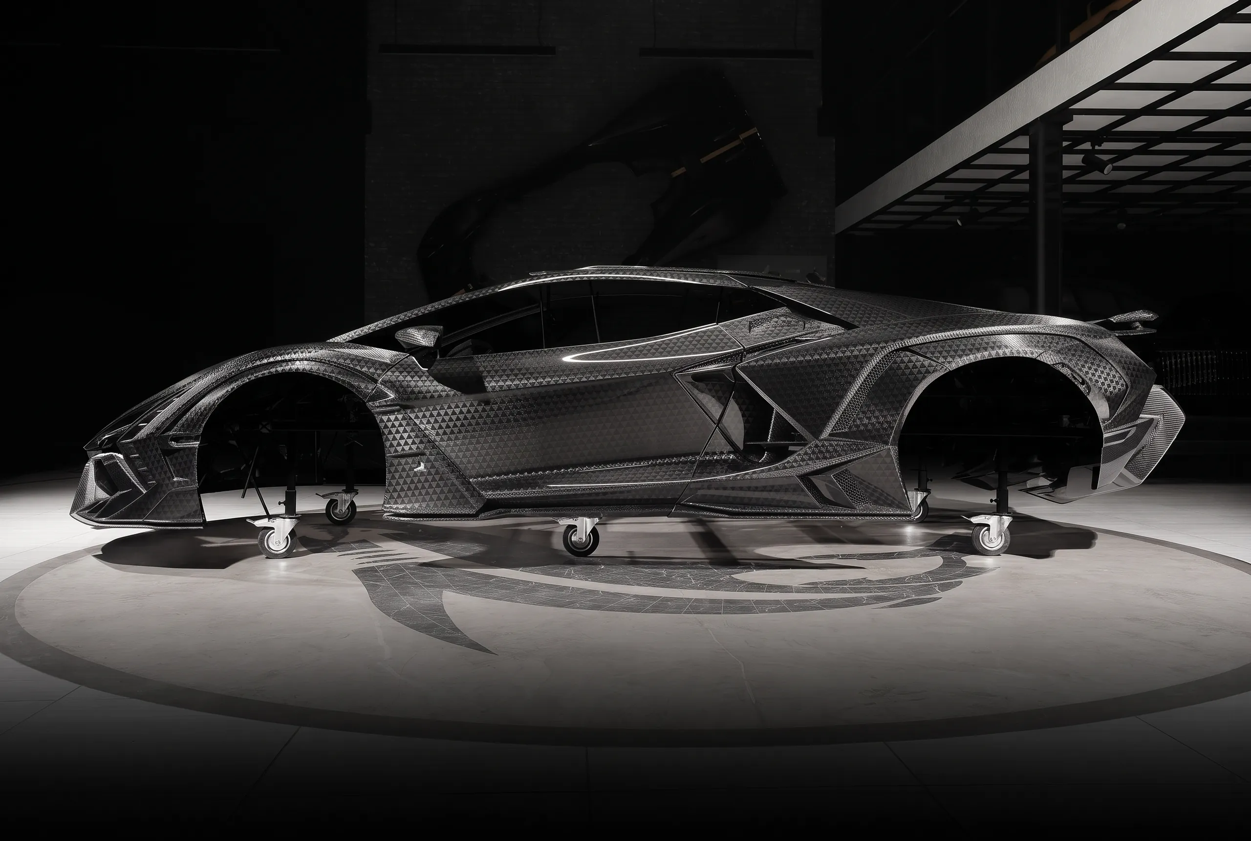 Side view of a Lamborghini Revuelto with TOPCAR R’Evo Stealth Edition carbon fiber body