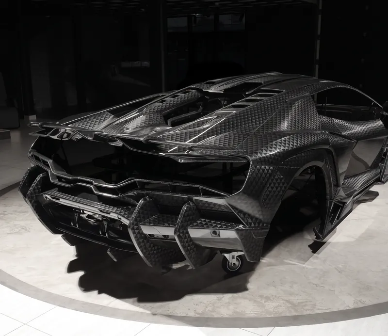 Rear of a Lamborghini Revuelto with diffuser and spoiler, TOPCAR R’Evo Stealth Edition