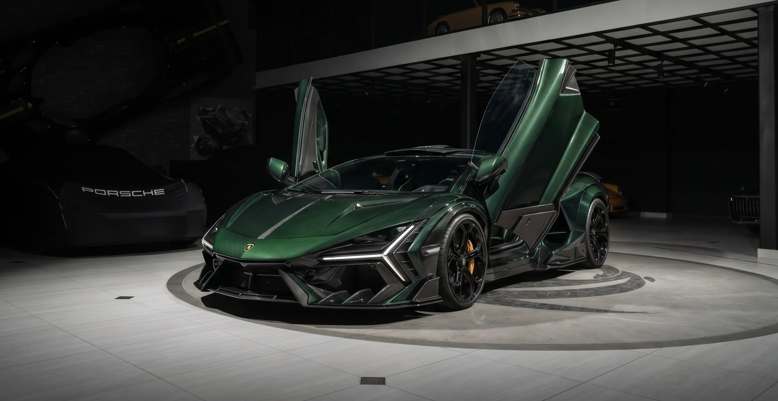 Lamborghini Revuelto with green carbon fiber body and TOPCAR DESIGN kit, scissor doors open