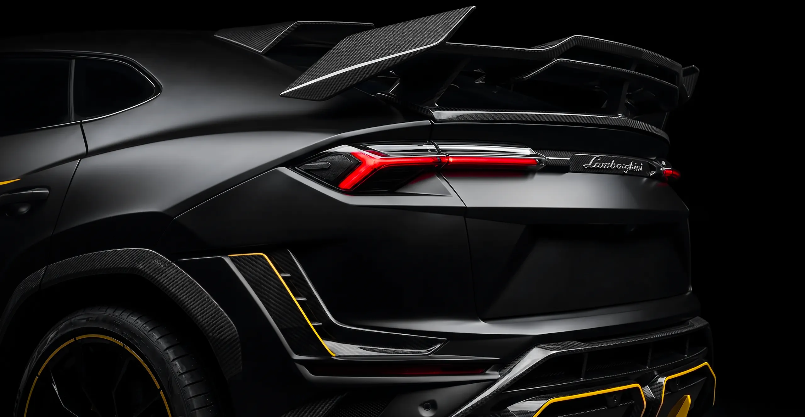 Rear of a Lamborghini Urus with TOPCAR DESIGN body kit, spoiler and carbon fiber components