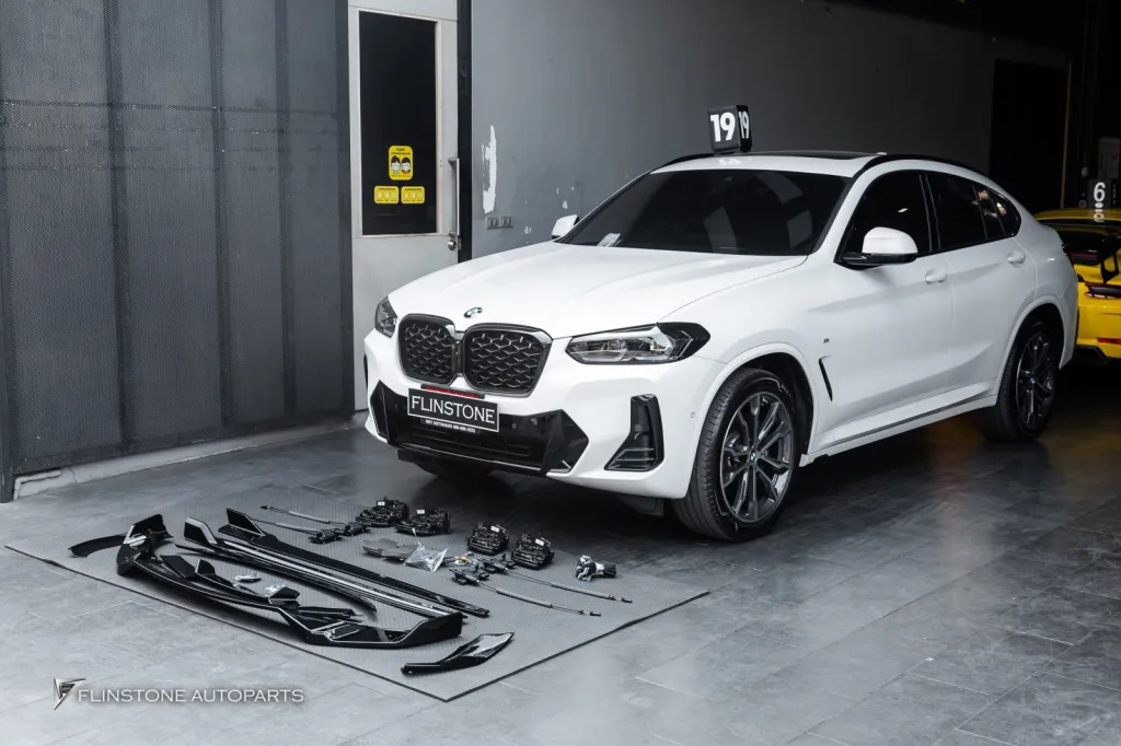 BMW X4 พาร์ทดำเงา ประตูดูด โลโก้