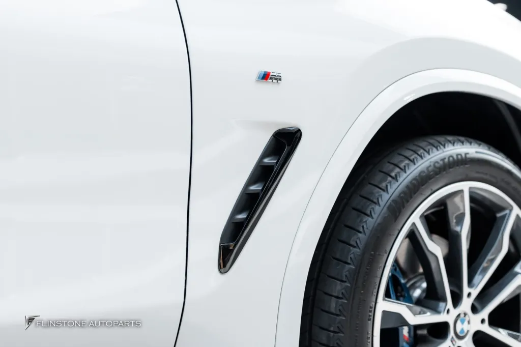 BMW X4 พาร์ทดำเงา ประตูดูด โลโก้