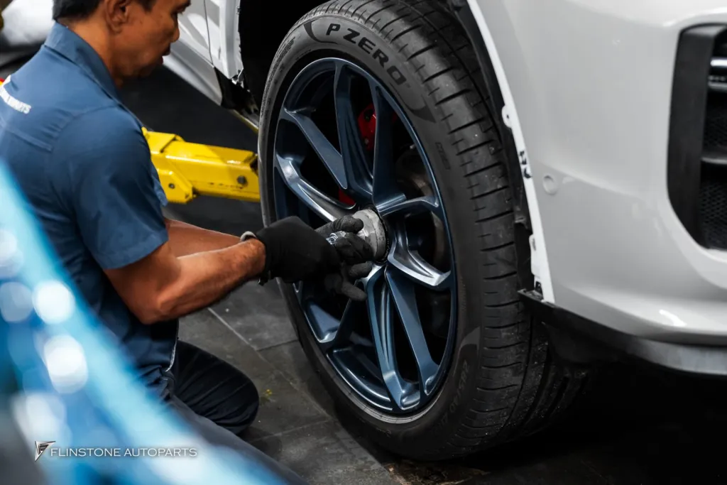 Porsche Cayenne wheels off Deep blue