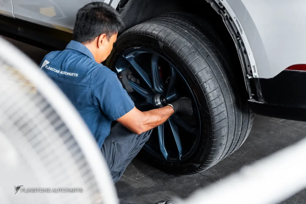 Porsche Cayenne wheels off Deep blue
