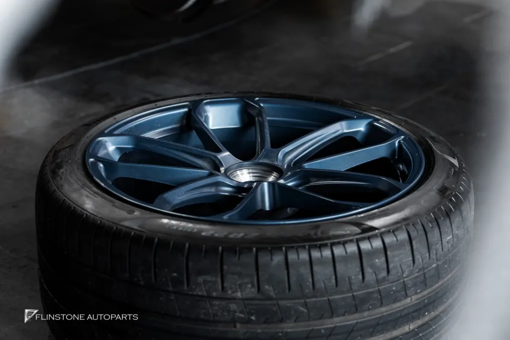 Porsche Cayenne wheels off Deep blue
